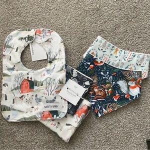 Bundle of bibs and washcloths.